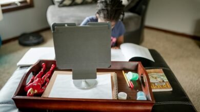 black flat screen computer monitor on brown wooden table